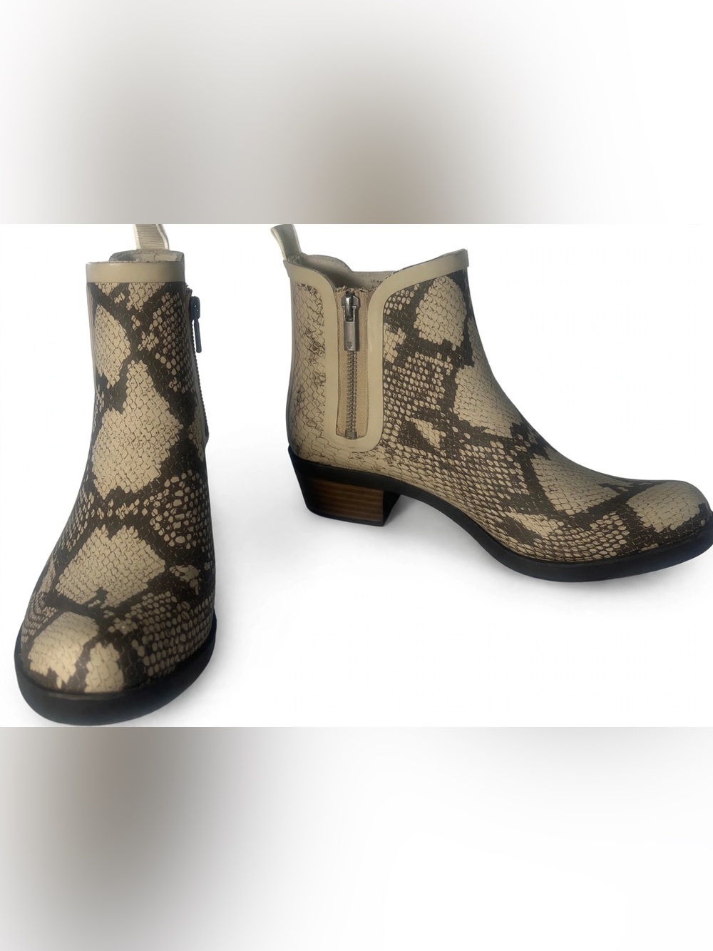 These are the Lucky Brand Basel H2O Rain Boot in a chic chinchilla snake prin